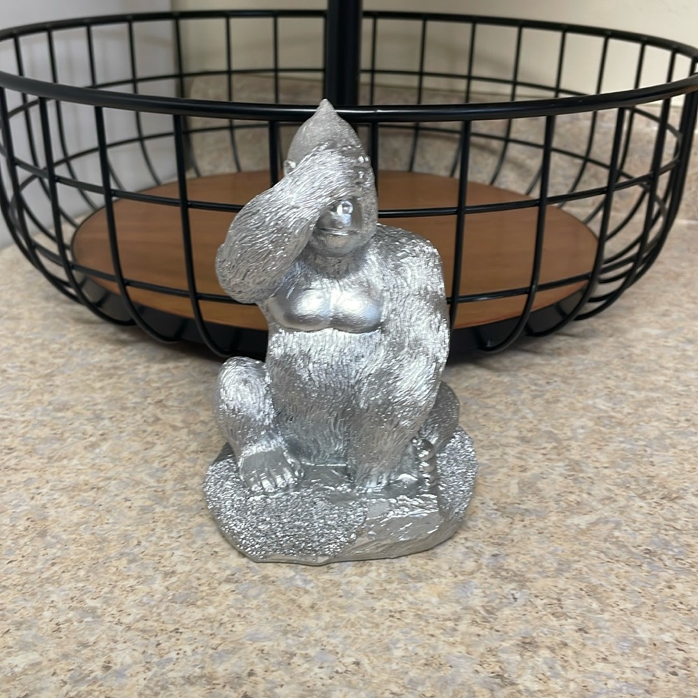 See no evil silver gorilla.
